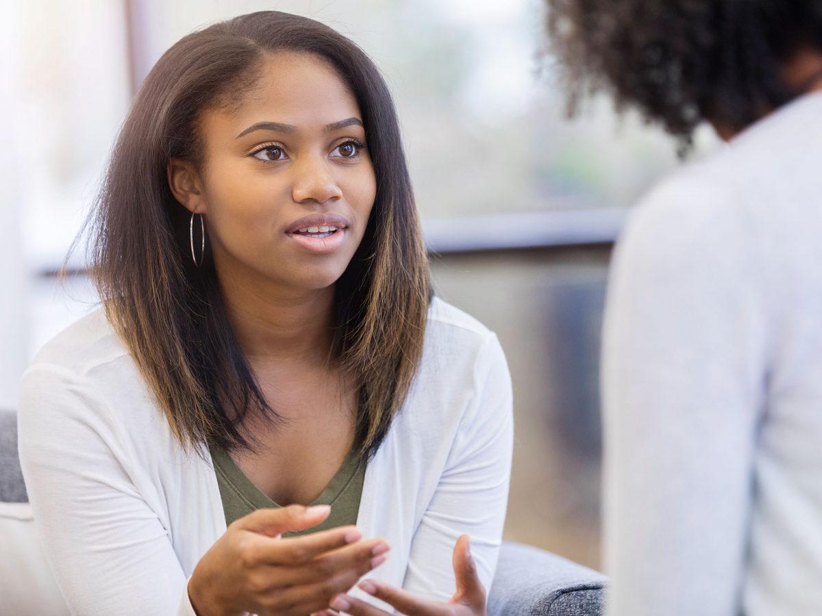 Young girl in therapy session with therapist.